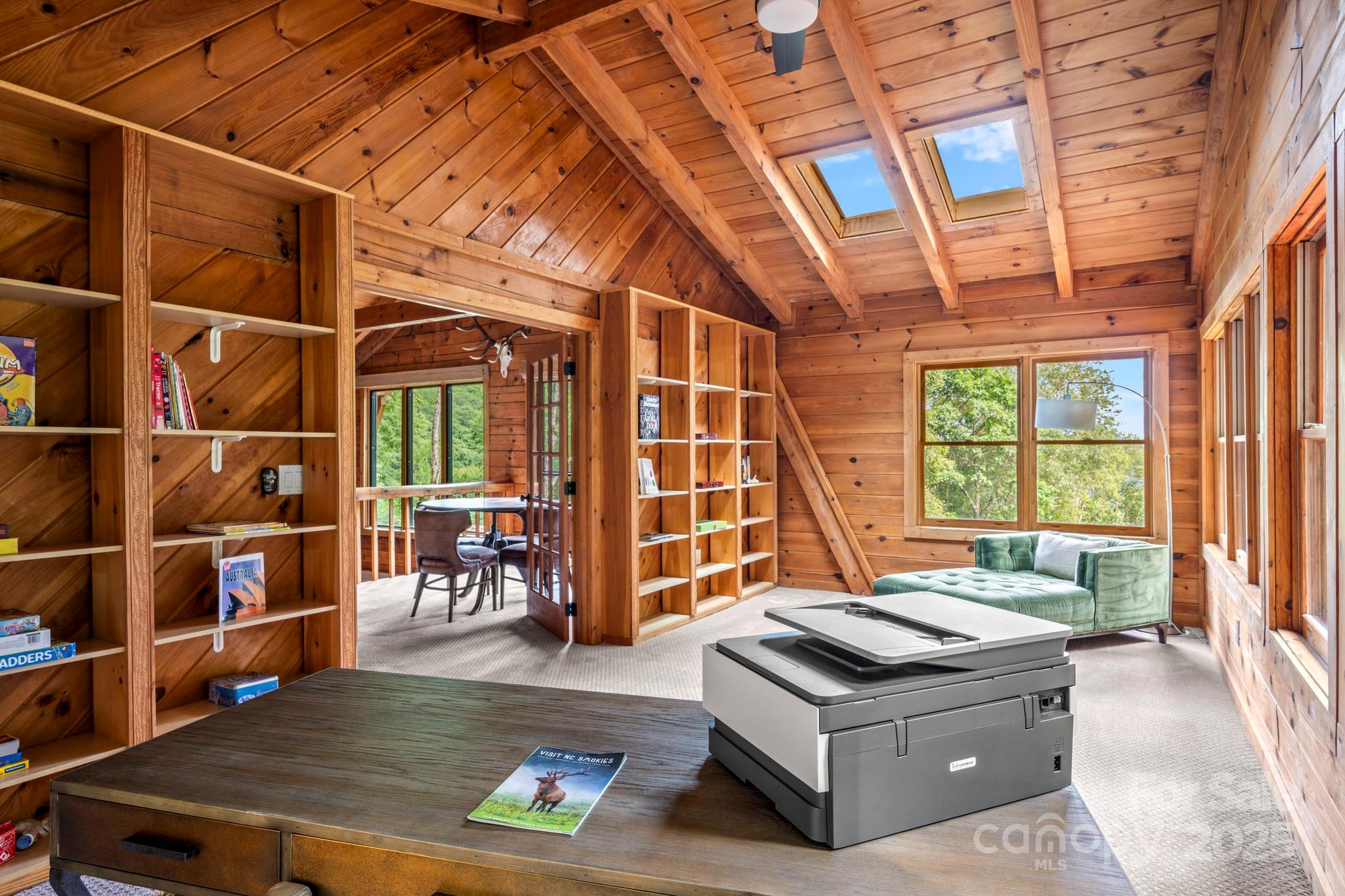 1933 Laurel Ridge North Maggie Valley, NC 28751 - Photo 31 of 45 a living room with furniture and a open kitchen view