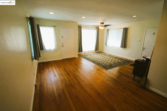a bath tub sitting next to a shower