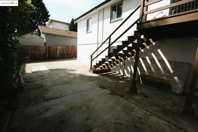 a bathroom with a toilet a sink and vanity