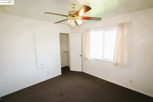 a view of a room with rack on the wall