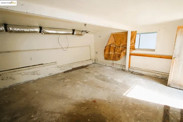 a kitchen with granite countertop a stove and a sink