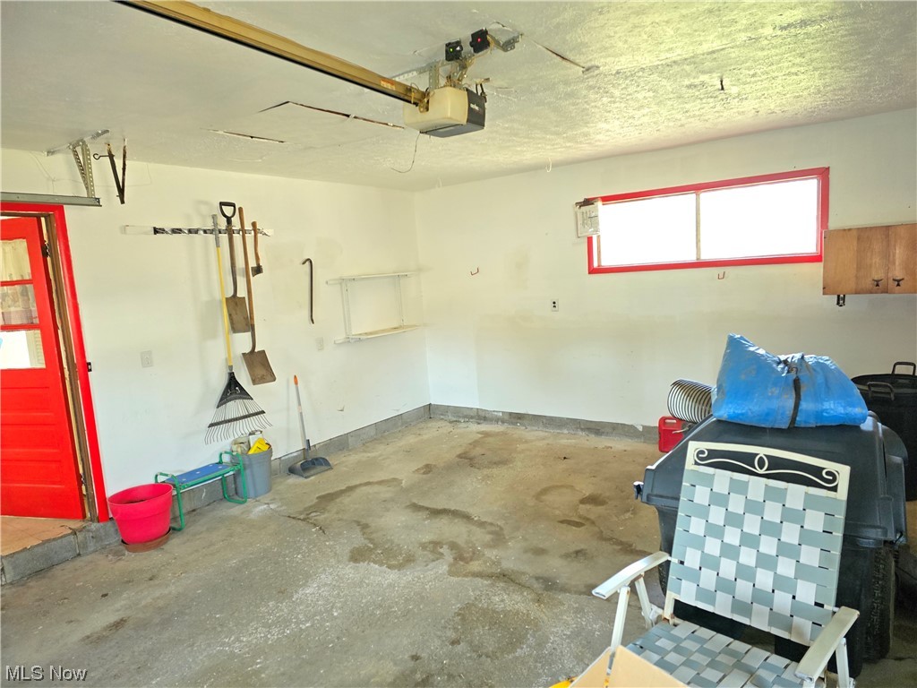 1450 Bonnie Road Macedonia, OH 44056 - Photo 21 of 21 Garage with a garage door opener