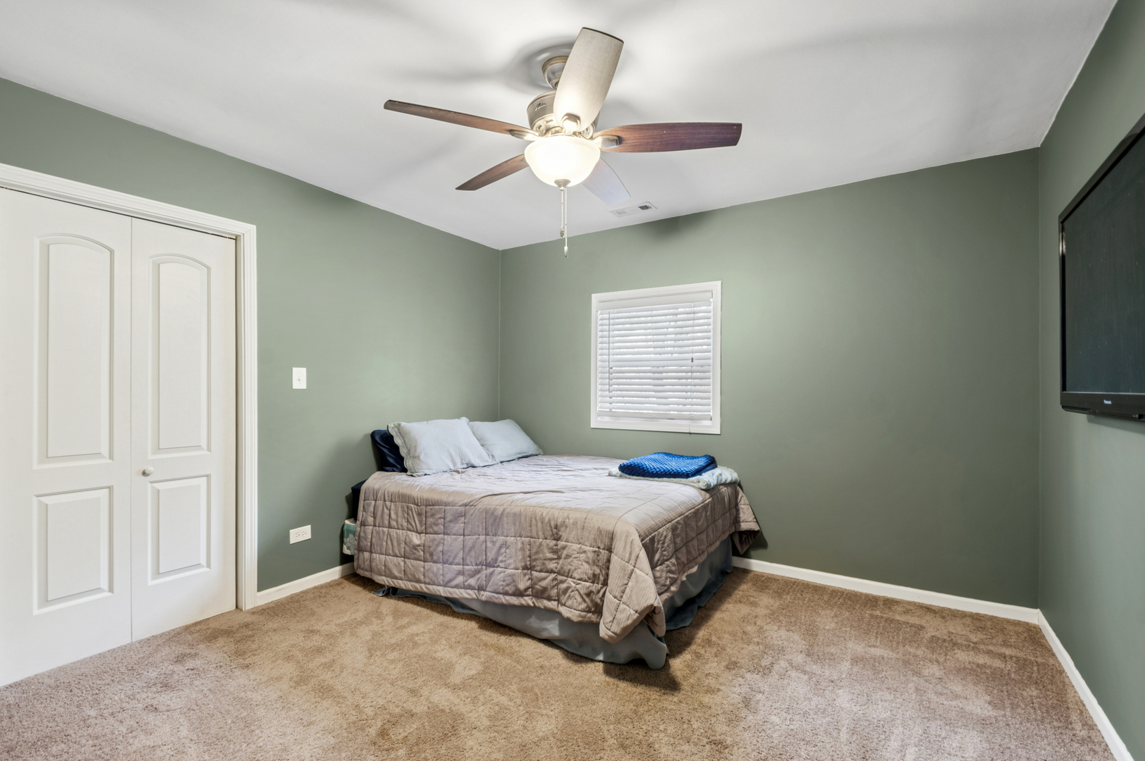2113 Highwood Road McHenry, IL 60051 - Photo 13 of 18 a bedroom with a bed and a window