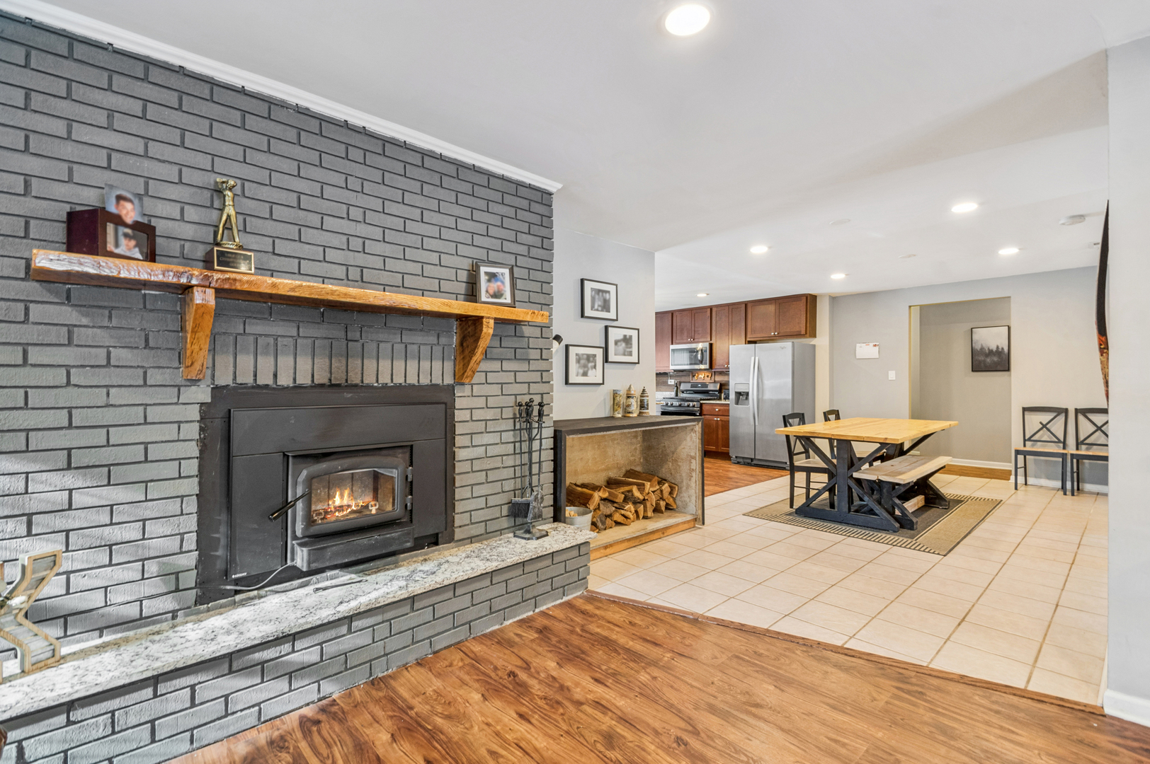 2113 Highwood Road McHenry, IL 60051 - Photo 6 of 18 a living room with furniture and a fireplace