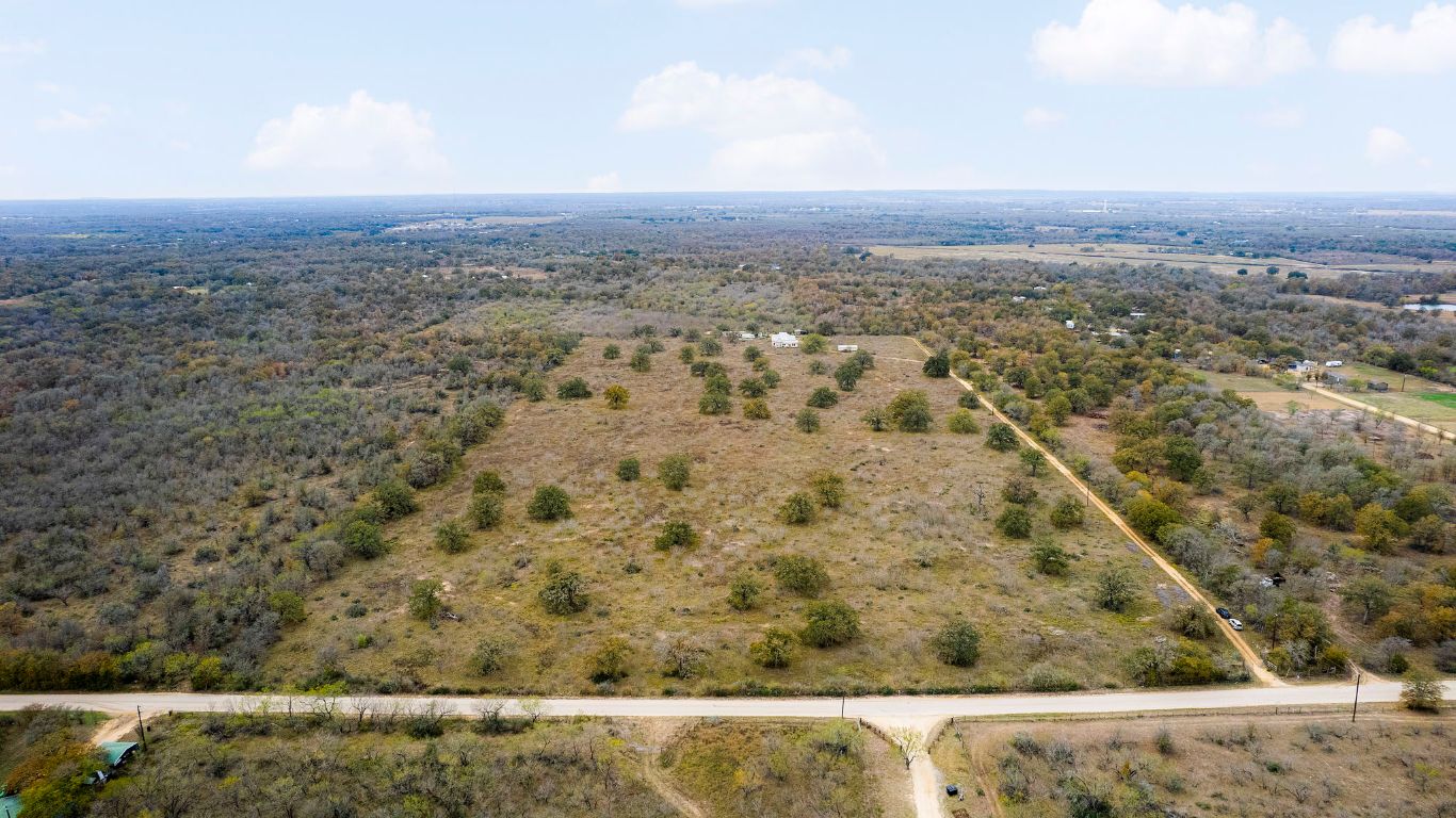 2124 Bugtussle Lane Luling, TX 78648 - Photo 13 of 25 a view of city and mountain