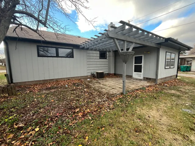a front view of a house with yard
