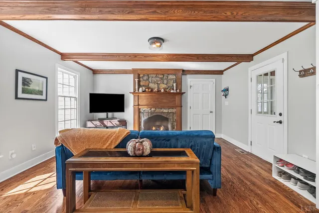 a bathroom with a granite countertop sink toilet a mirror and shower
