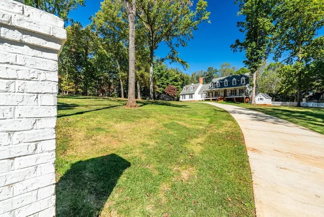 a view of a livingroom with furniture and a flat screen tv