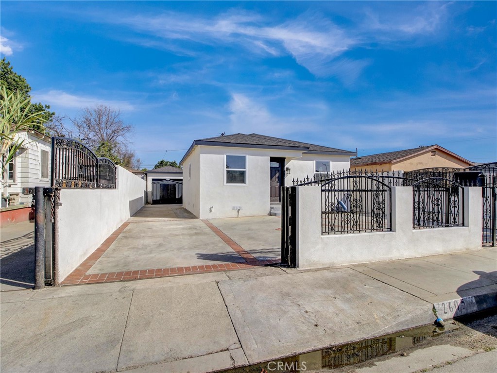2605 East 132nd Street Compton, CA 90222 - Photo 1 of 1 a view of a house with a patio