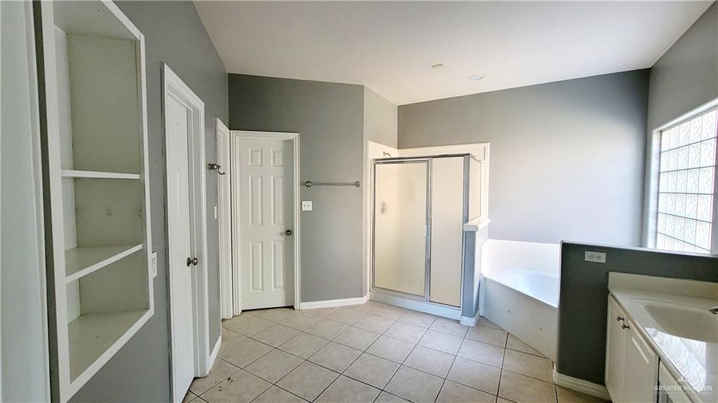 3003 El Jardin Street Mission, TX 78572 - Photo 13 of 25 a view of a kitchen with an empty space and a window