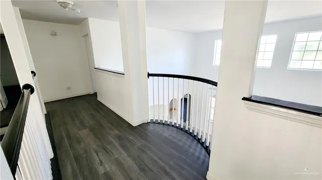 a view of entryway with wooden floor