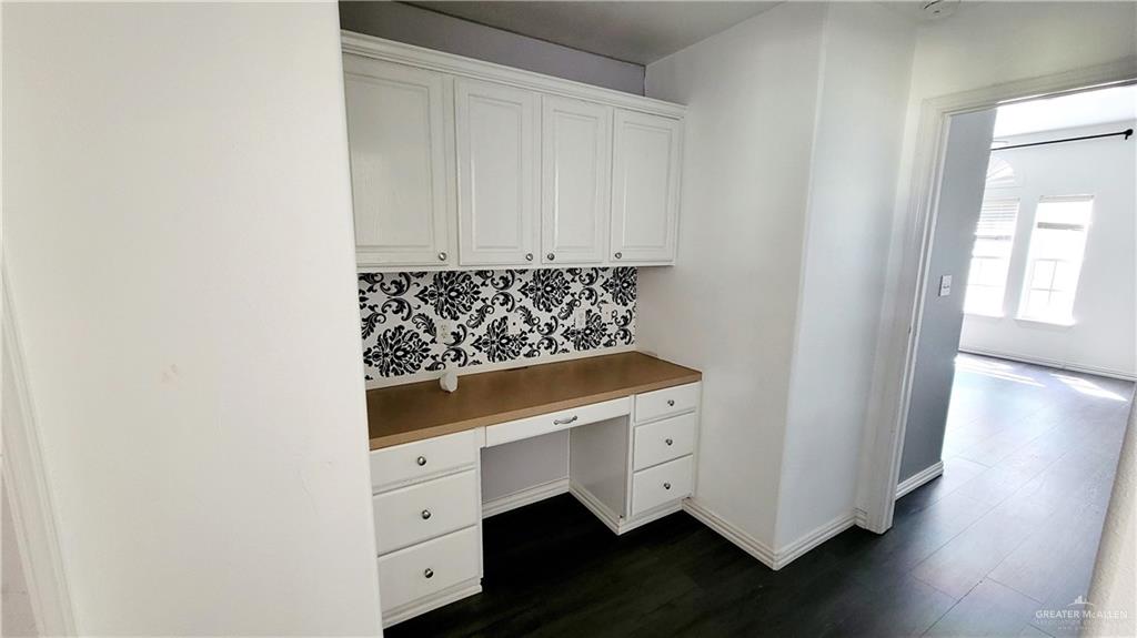 3003 El Jardin Street Mission, TX 78572 - Photo 19 of 25 a view of cabinets and wooden floor