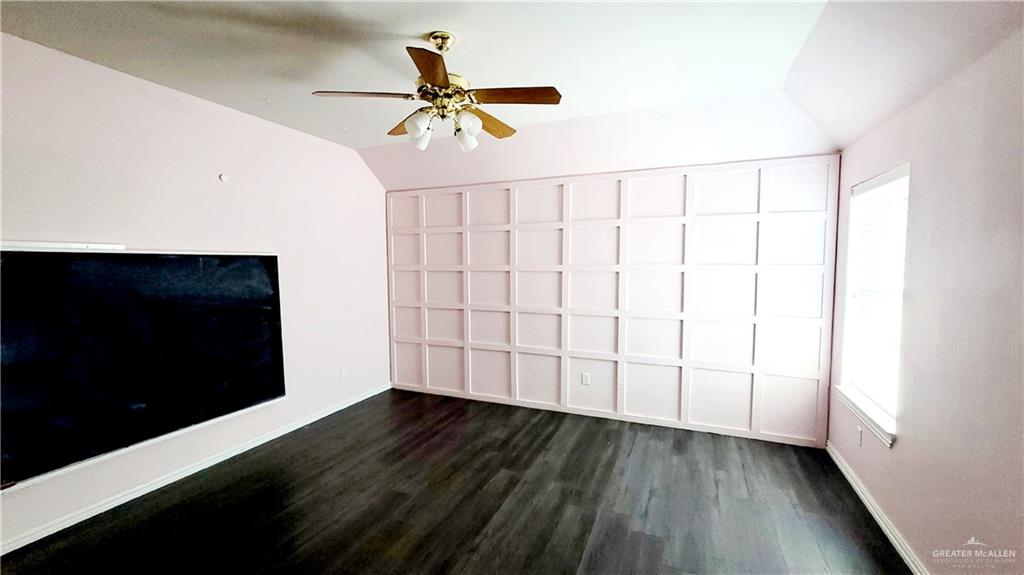3003 El Jardin Street Mission, TX 78572 - Photo 21 of 25 a view of empty room with wooden floor and fan