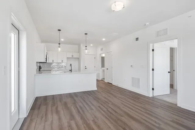 a view of kitchen with wooden floor
