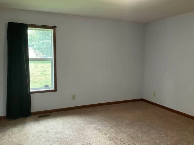 an empty room with a window