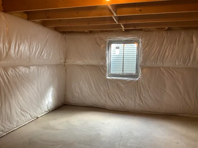 a view of a house with a yard and deck