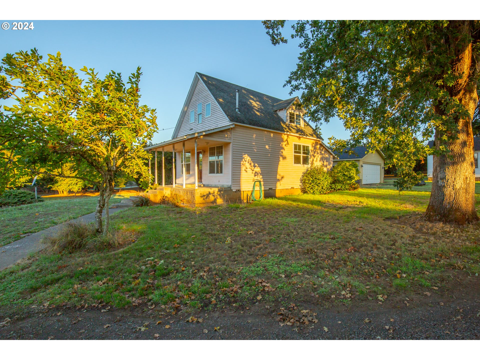 26413 Franklin Road Junction City, OR 97448 - Photo 13 of 44 a view of a house with a yard