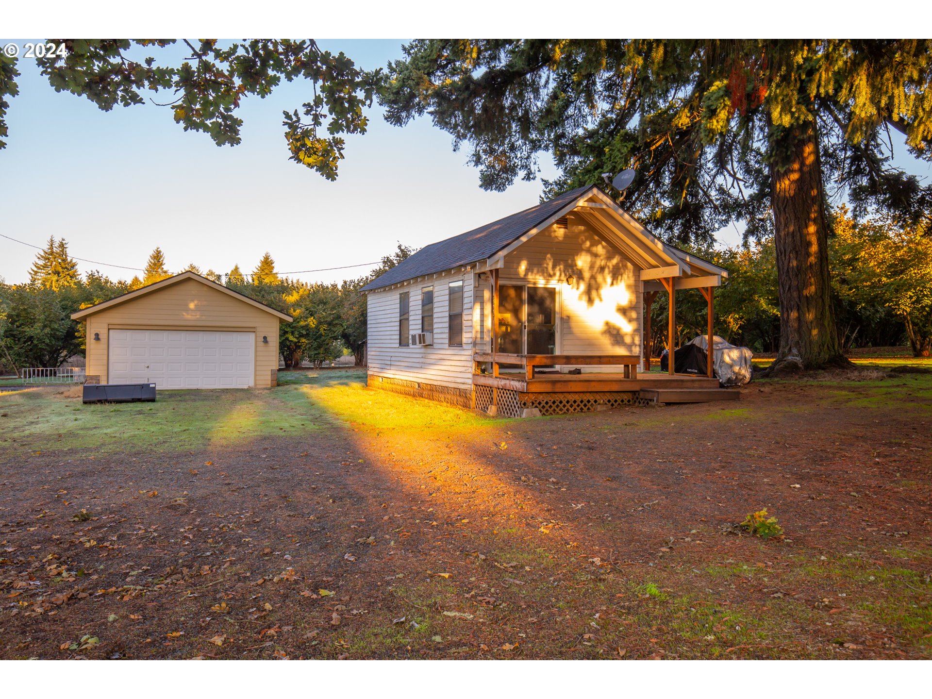 26413 Franklin Road Junction City, OR 97448 - Photo 14 of 44 a view of a house with a swimming pool