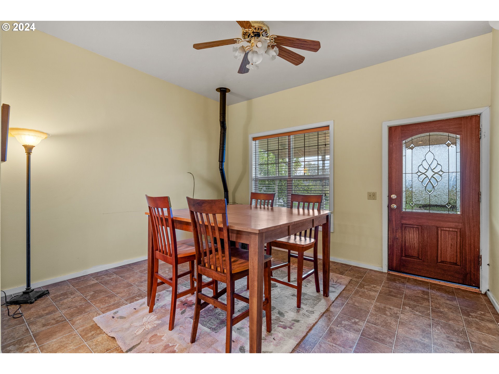 26413 Franklin Road Junction City, OR 97448 - Photo 17 of 44 a view of a dining room with furniture and wooden floor