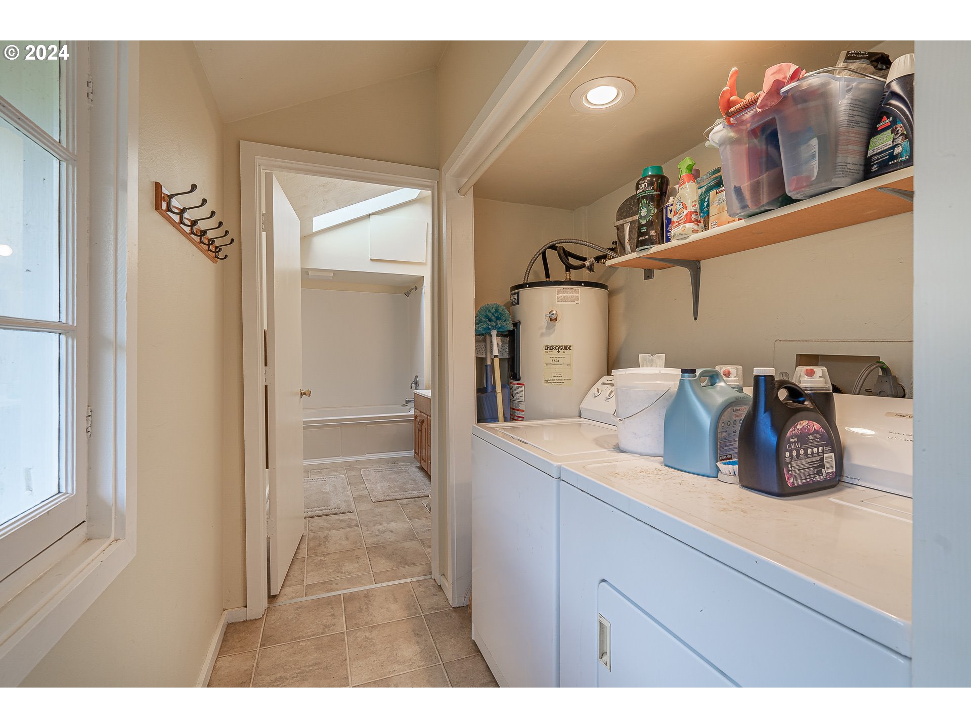 26413 Franklin Road Junction City, OR 97448 - Photo 23 of 44 a bathroom with a sink a mirror and a shower