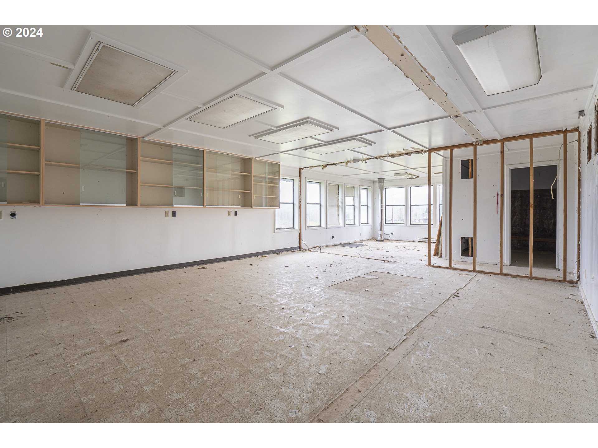 26413 Franklin Road Junction City, OR 97448 - Photo 42 of 44 a view of an empty room with wooden floor