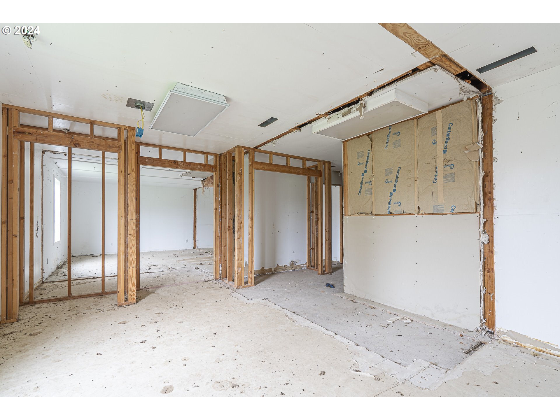 26413 Franklin Road Junction City, OR 97448 - Photo 43 of 44 a view of a big room with closet and windows