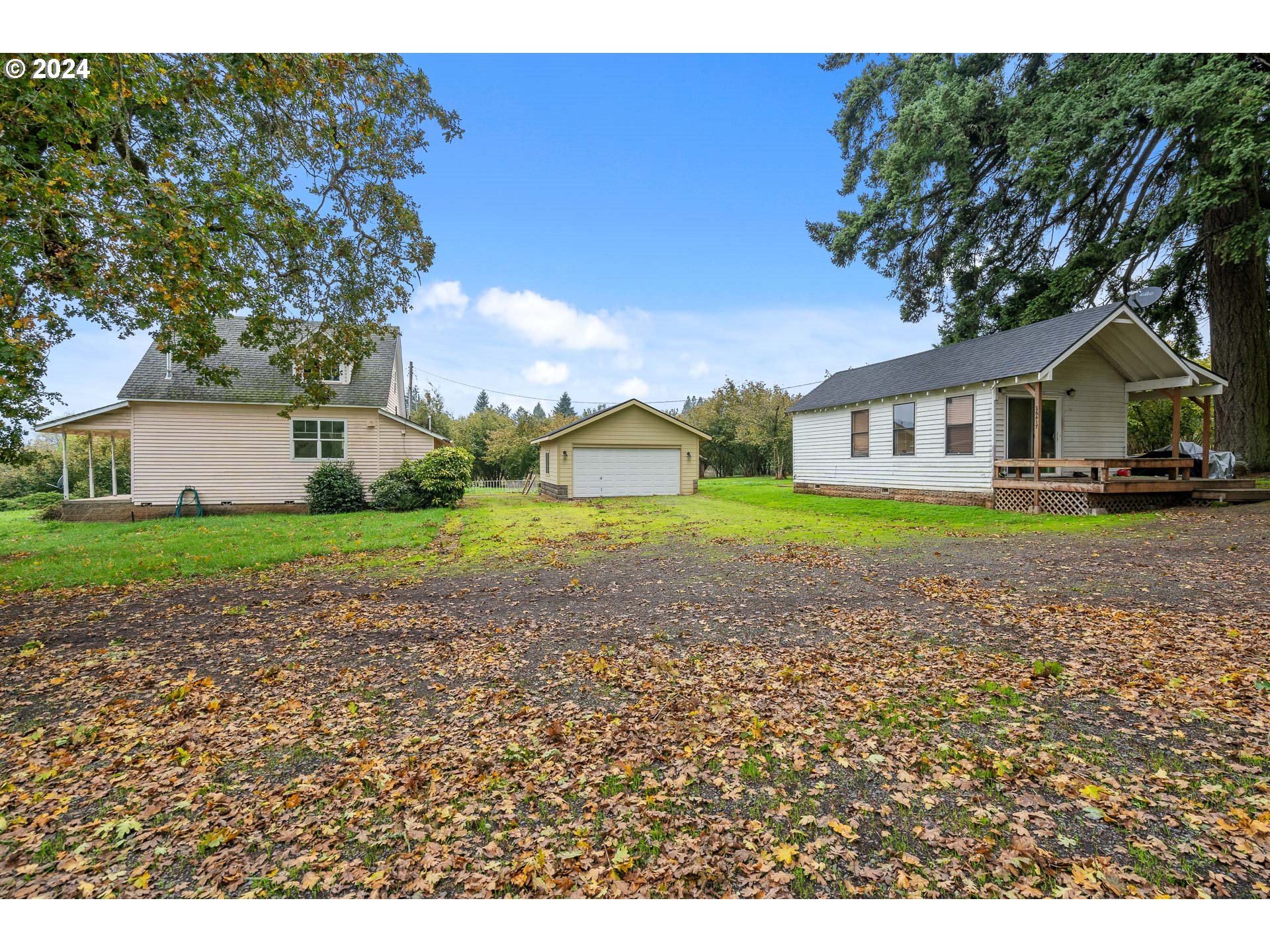 26413 Franklin Road Junction City, OR 97448 - Photo 10 of 44 a house with green field in front of it