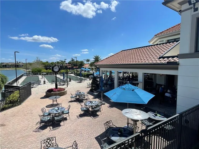 a view of a chairs and tables in the patio