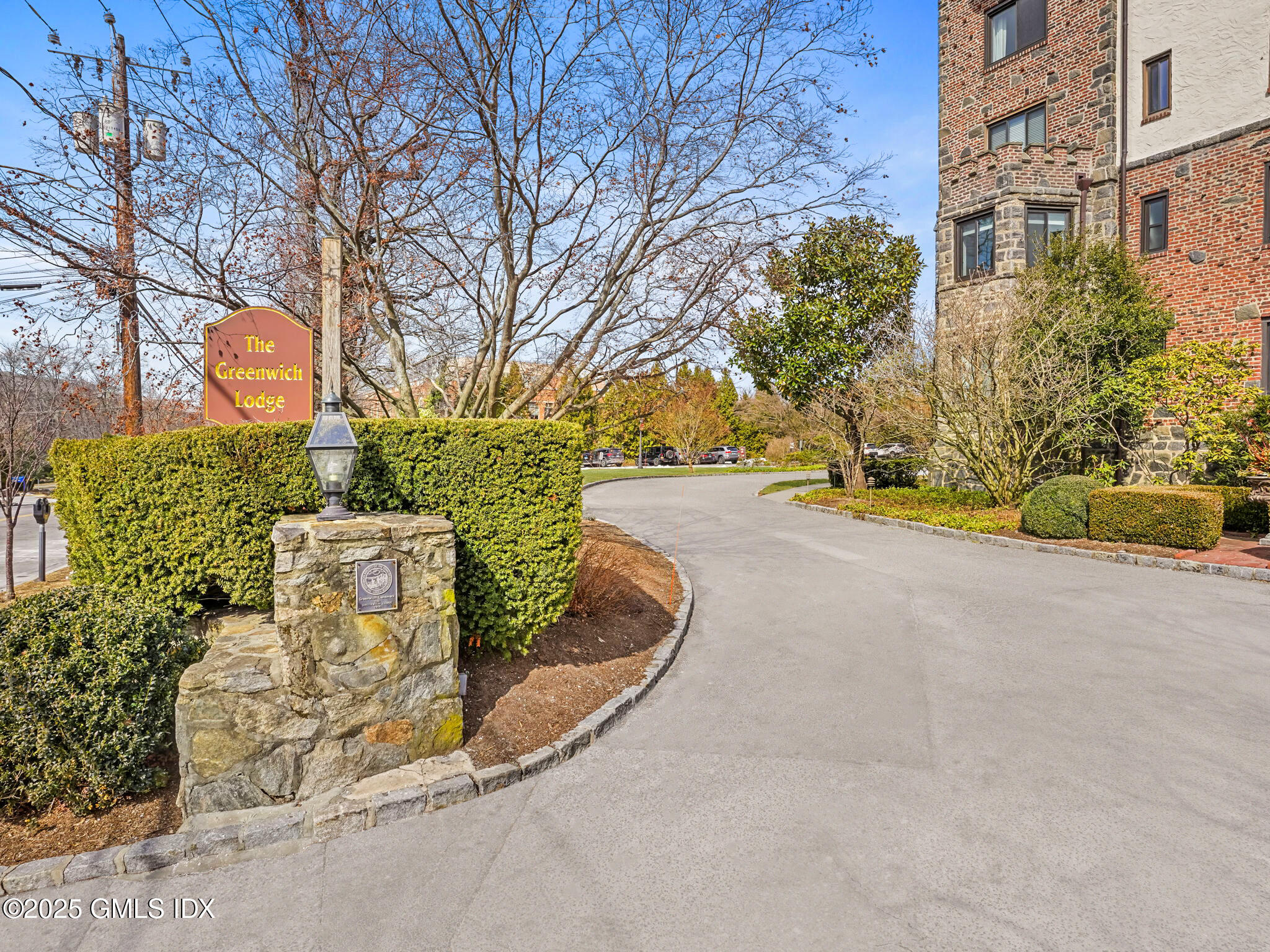 47 Lafayette Place, Unit 3H Greenwich, CT 06830 - Photo 16 of 18 a view of a street with a building in the background