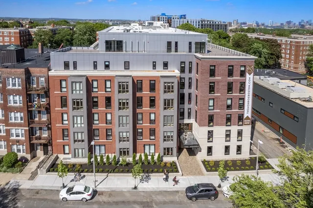 a view of a building with a street