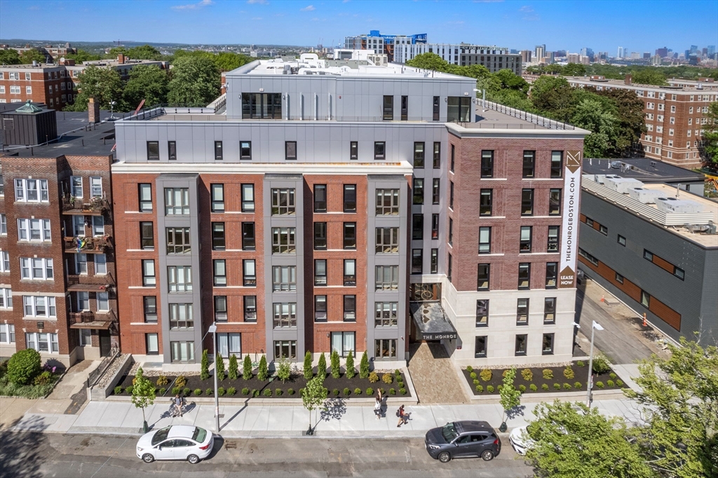 a view of a building with a street