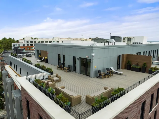 a view of a terrace with chairs