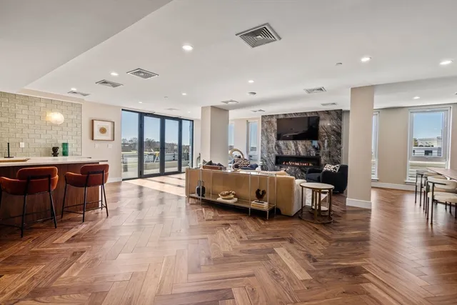 a living room with furniture and a table