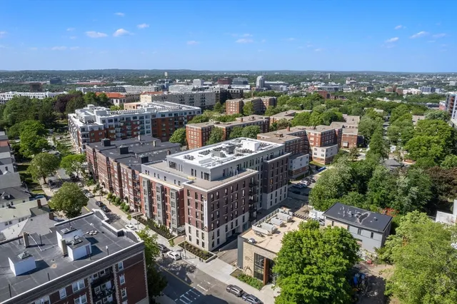 an aerial view of a balcony with city view