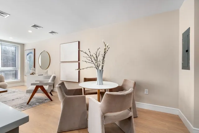 a view of a livingroom with furniture and a table