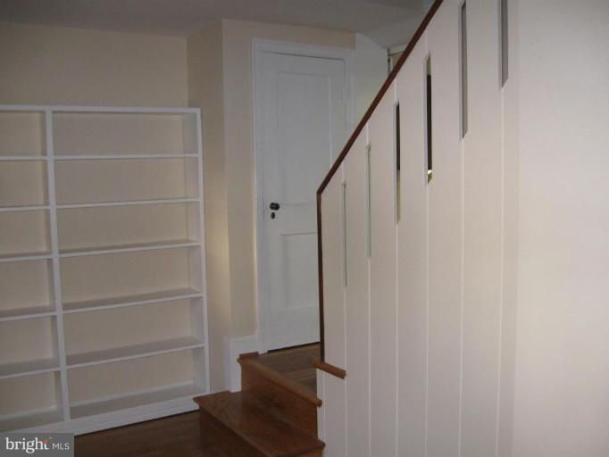 5319 Wakefield Road Bethesda, MD 20816 - Photo 7 of 29 Stairs/coat closet