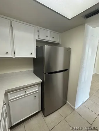a close view of a refrigerator in kitchen