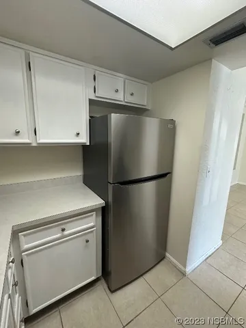 a close view of a refrigerator in kitchen