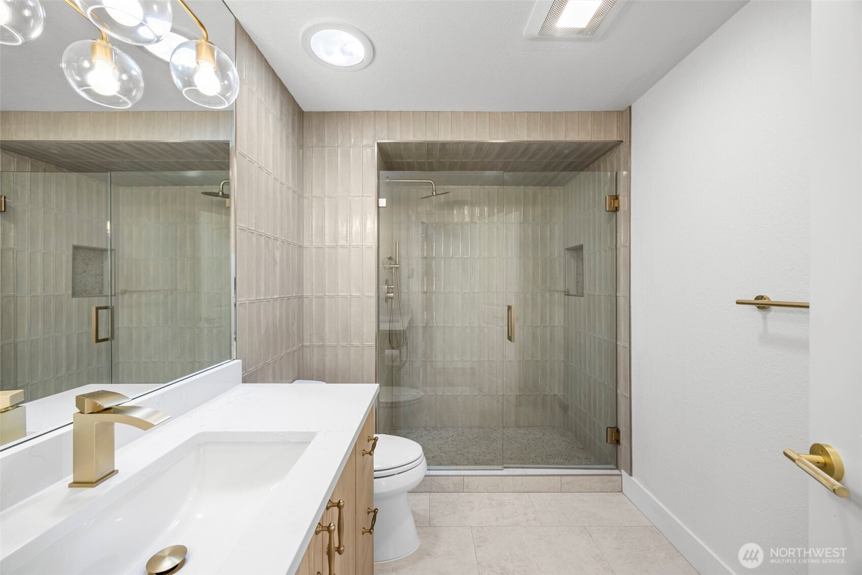 121 West Winesap Road Bothell, WA 98012 - Photo 16 of 29 a bathroom with a sink a toilet and shower
