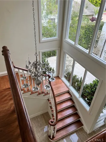 a view of a balcony with chairs