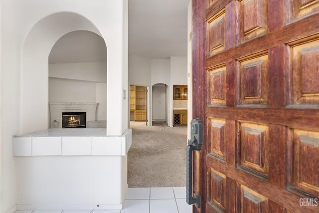 a view of an entryway with a fireplace