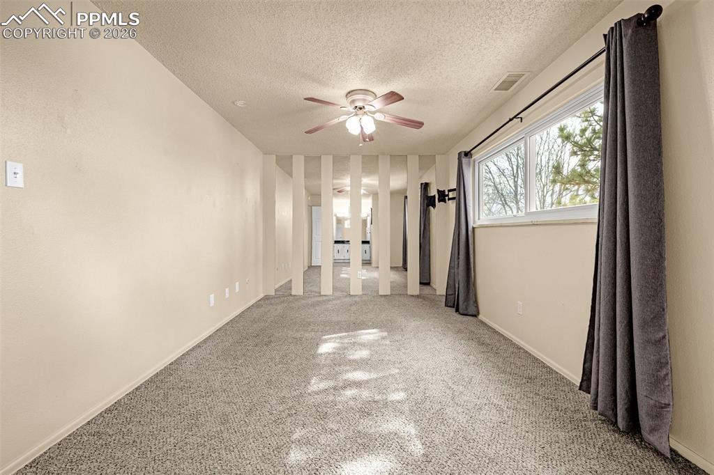130 Scotland Road, Unit D Pueblo, CO 81001 - Photo 10 of 20 a view of a chandelier fan and entryway