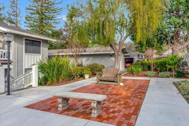 a view of a backyard with a deck