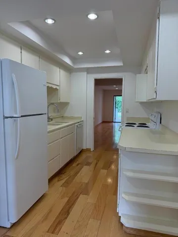 a view of hallway with natural light