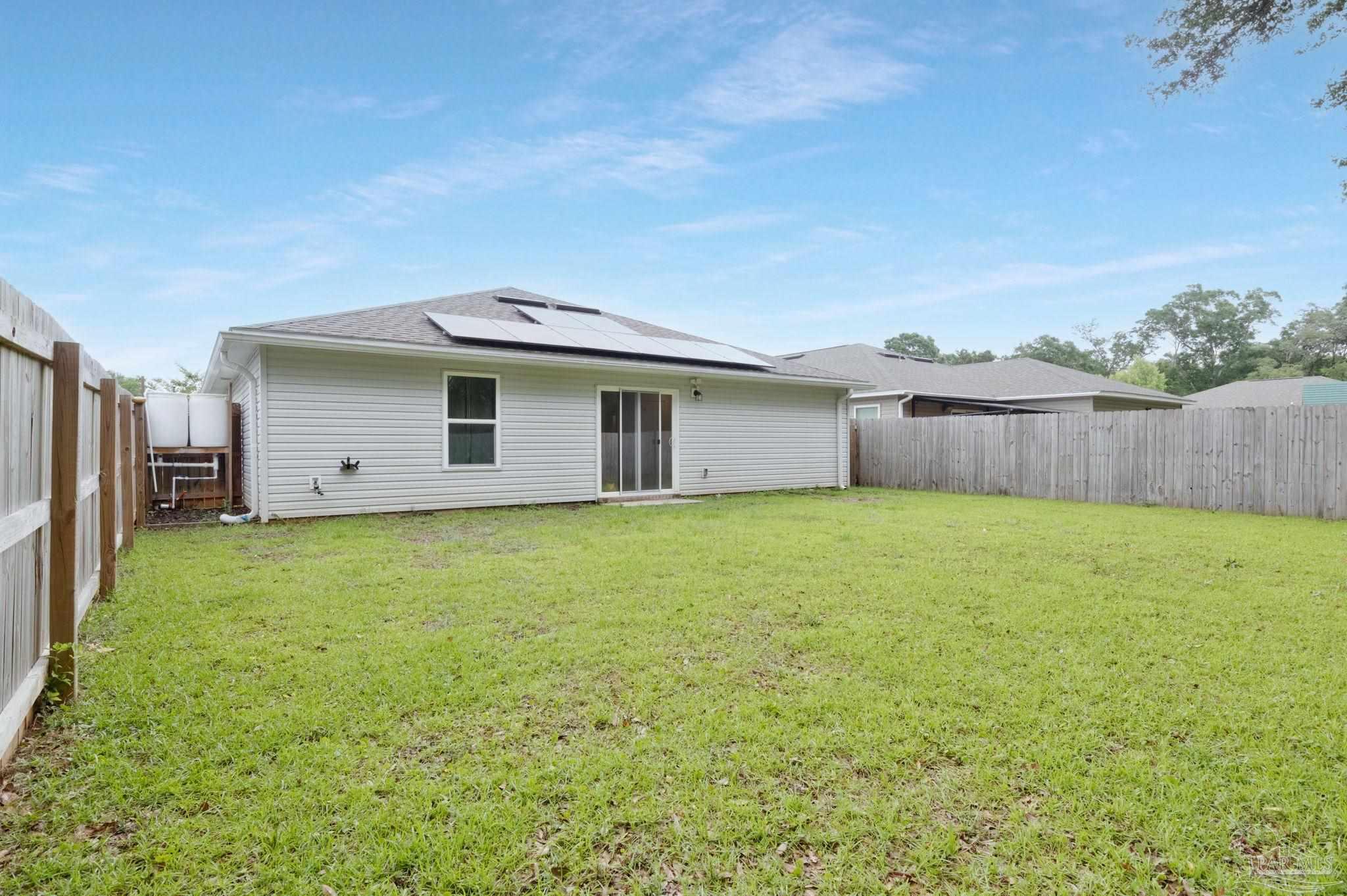 1625 Addies Way Pensacola, FL 32534 - Photo 43 of 50 a view of a backyard with a garden