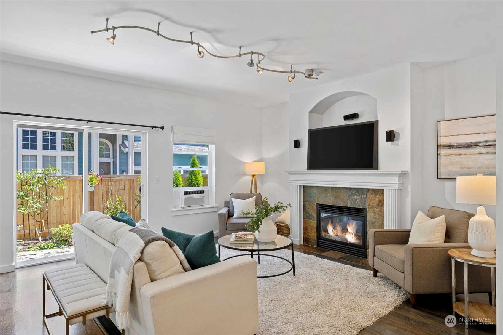 23825 17th Avenue West Bothell, WA 98021 - Photo 15 of 35 a living room with furniture fireplace and a window