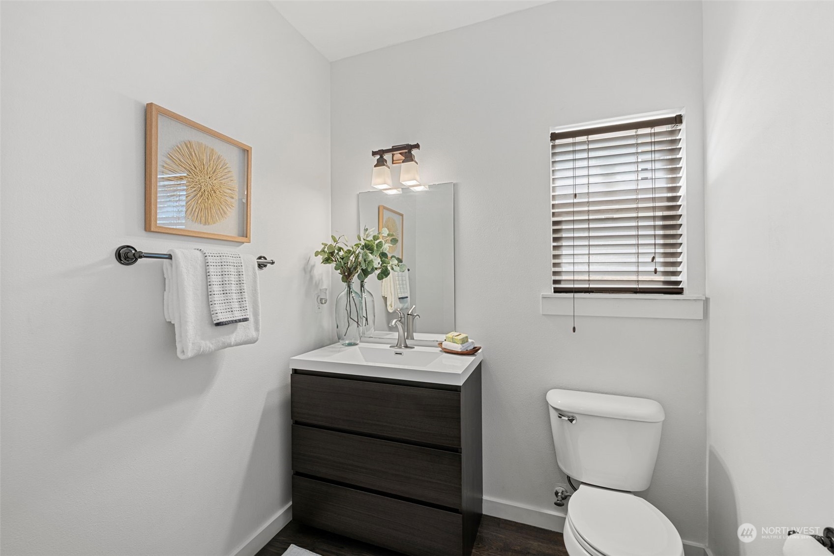 23825 17th Avenue West Bothell, WA 98021 - Photo 16 of 35 a bathroom with a toilet a sink and a mirror