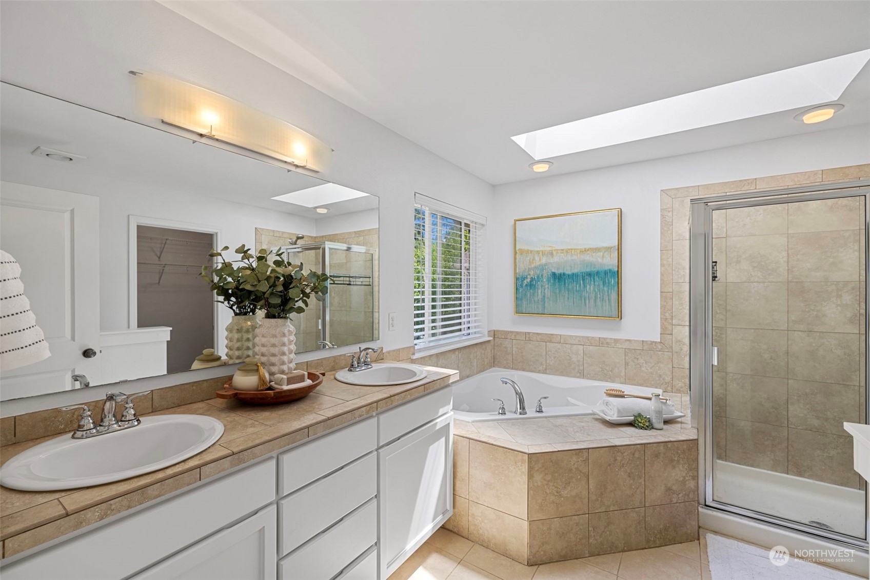 23825 17th Avenue West Bothell, WA 98021 - Photo 20 of 35 a bathroom with a granite countertop sink and a mirror