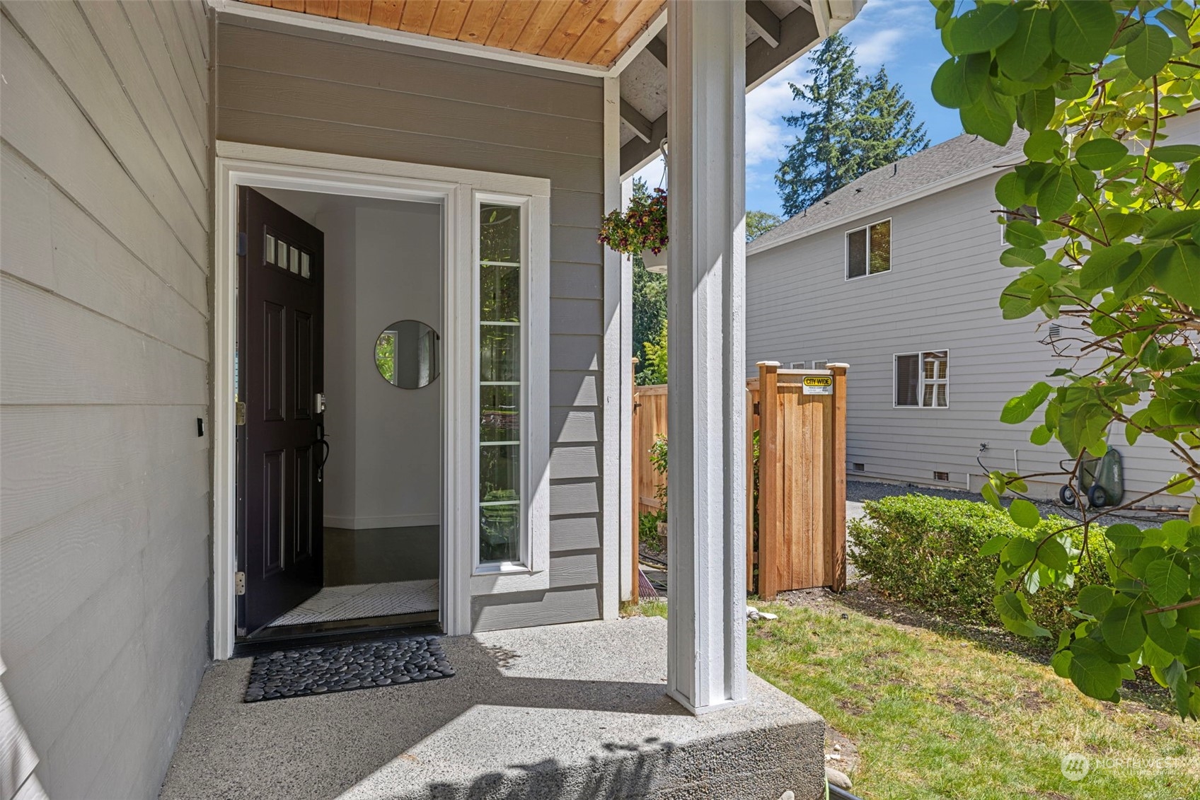 23825 17th Avenue West Bothell, WA 98021 - Photo 2 of 35 front view of a house with a glass door