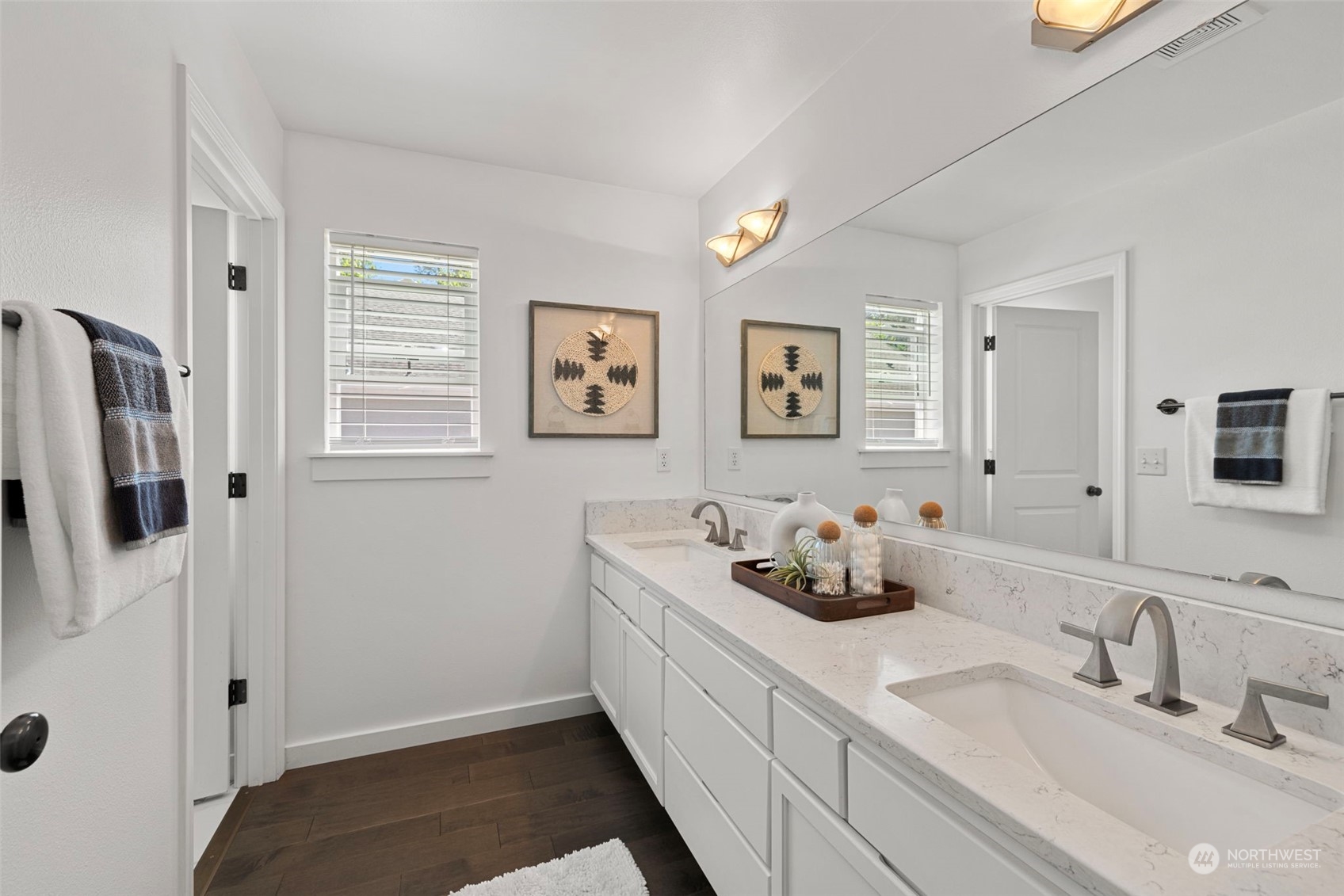 23825 17th Avenue West Bothell, WA 98021 - Photo 24 of 35 a bathroom with double vanity and a mirror